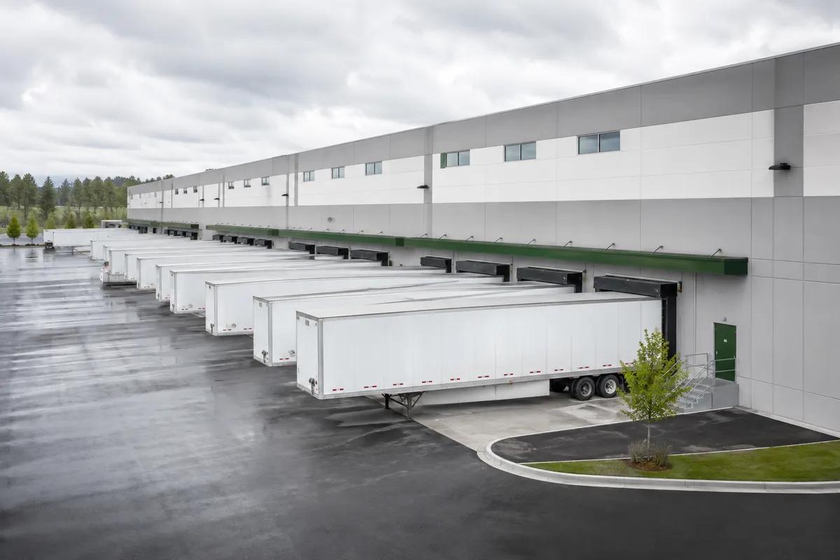 Freight trailers at the loading bays of a distribution warehouse
